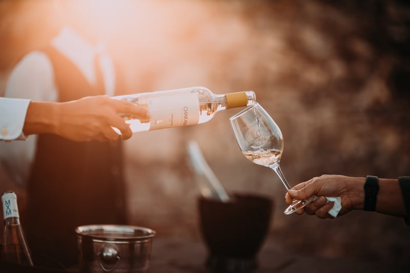 Pouring wine samples in wine festival