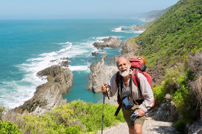 Healthy geriatric hiking the Garden Route, South Africa