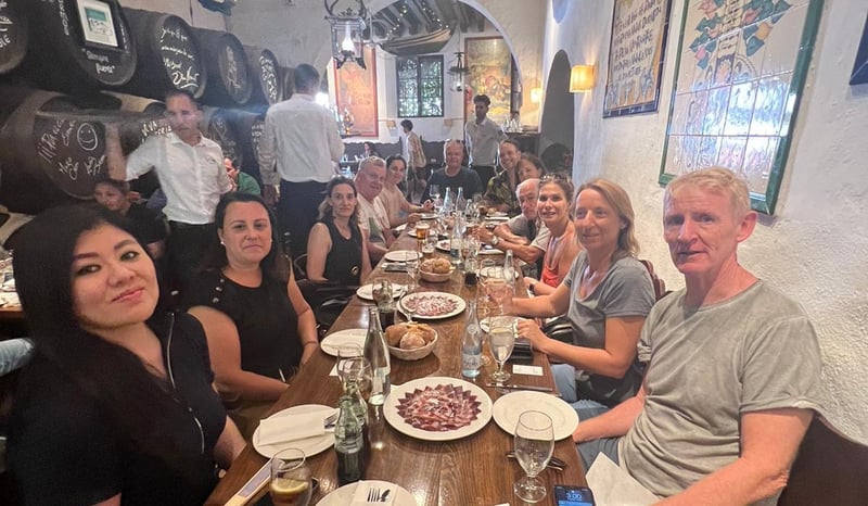 The Storylines group enjoying a meal
