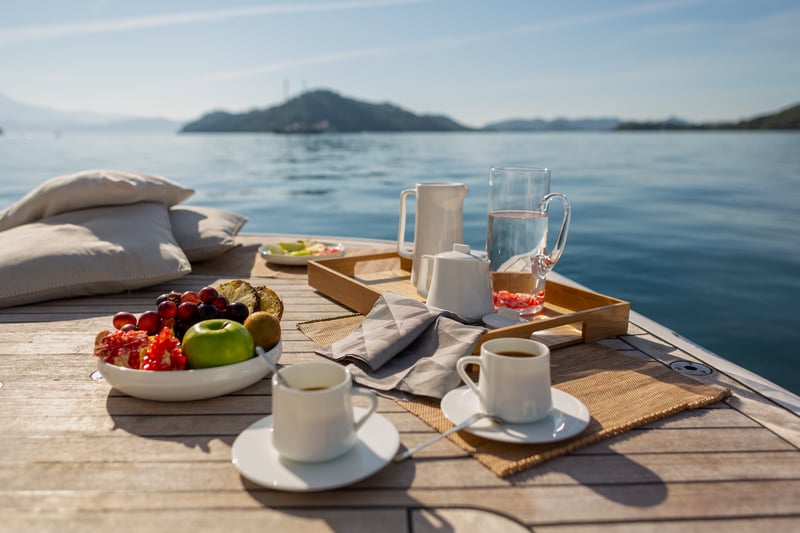 Table on cruise ship with left over food for blue zone secrets 80% rule