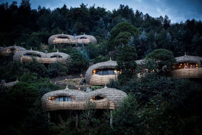 Wilderness Safaris Bisate Lodge exterior during the night