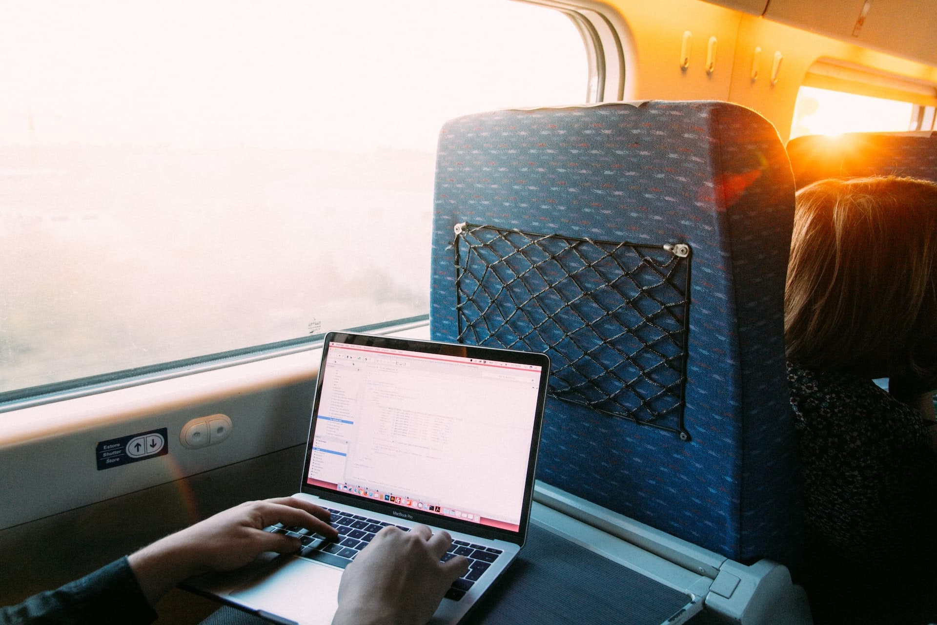 Working on laptop from a train part of the new travel lifestyle